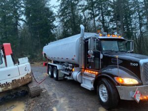 Fueling Back Hoe on construction site